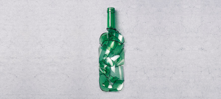 A bottle made of pieces of other bottles